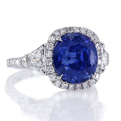 Montpassier three-stone ring, featuring 6.97 carat cushion sapphire. by Leon Mege